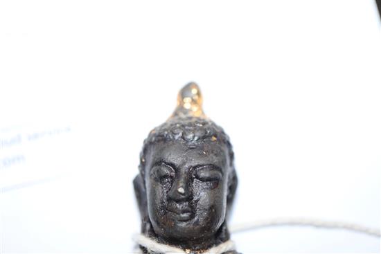 A 17th century Chinese gilded bronze Buddha H.10.5cm